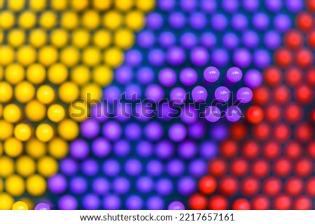 Rainbow stimulator for development of creative thinking and imagination. Blurred multi-colored express sculptor as abstract background macro