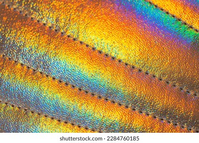 Rainbow texture. Optical effect. Interference of light. Colorful bands