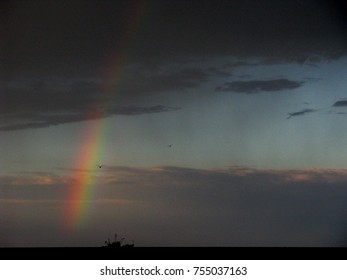 
Rainbow in a thunderstorm