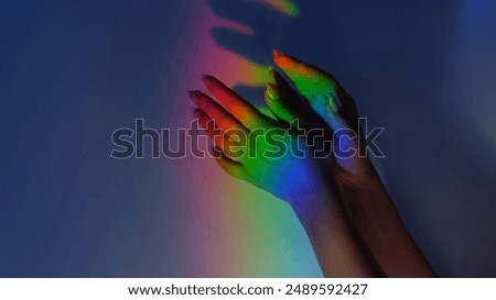 Similar – Foto Bild Frauenhand mit einem darin projizierten Regenbogen