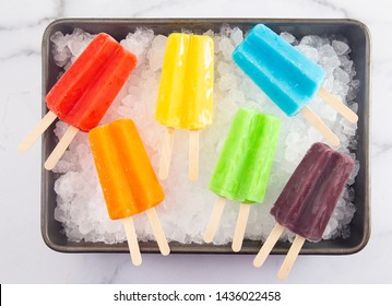 Rainbow Two Stick Popsicles in a a Box of Ice