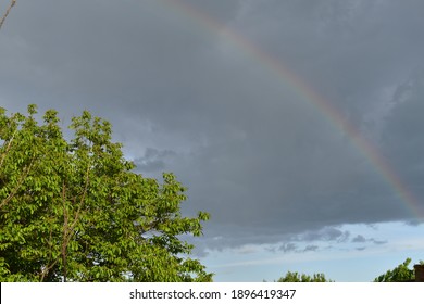 Rainbow in the village Kazimirawka, Belarus - Shutterstock ID 1896419347