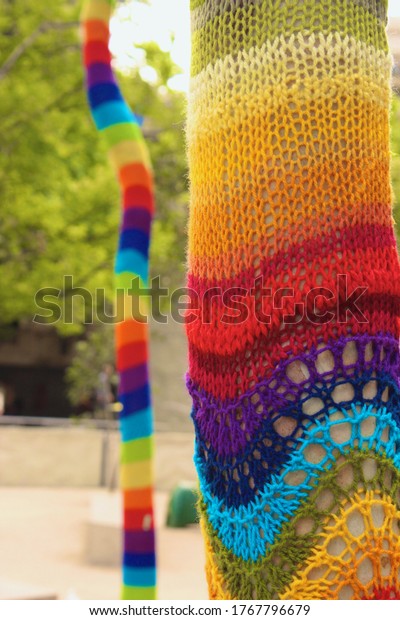 Rainbow\
yarn bombing in City Square, Melbourne,\
Australia