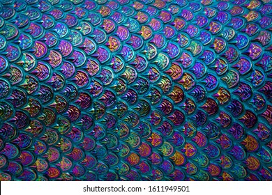 Rainbow-colored Fish Scale Pattern And Texture Wall. Colorful Abstract Background. 