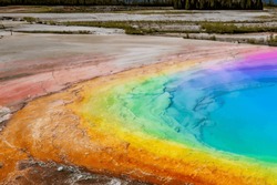 Rainbow-colored Hot Springs- Visit Geothermal Areas With Rainbow-colored Hot Springs, Such As The Grand Prismatic Spring In Yellowstone National Park, Showcasing Vibrant Hues Caused By Mineral-rich