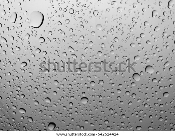 Raindrop background, abstract background,
Condensation on the glass
surface.