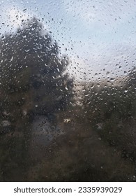 Raindrops in a flat window