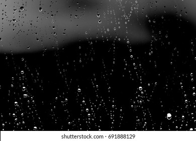 Raindrops On Black Glass