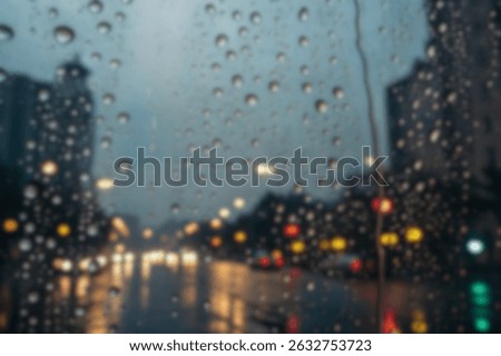 Raindrops on bus window and lights