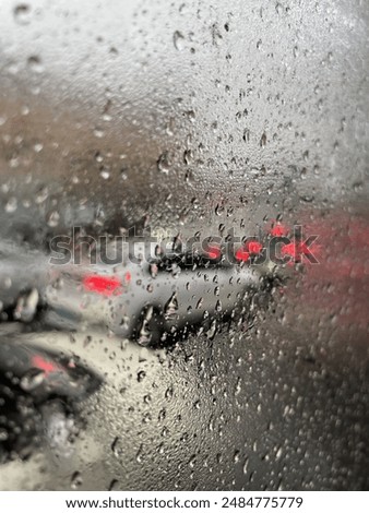 Raindrops on the car windows.
