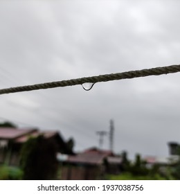 Raindrops On Clothes Line. Select Focus Concept And Blur Background.