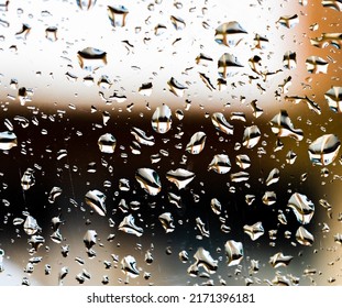 Raindrops on the glass. Raindrops background. Raindrops texture. Raindrops close-up. Water drops.