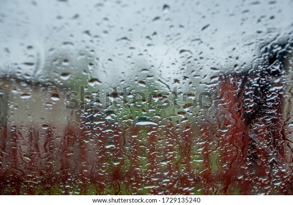 raindrops on glass,\
car glass with\
raindrops