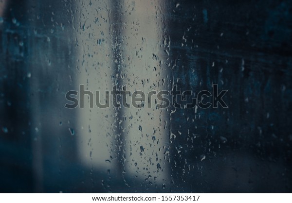 Raindrops on gray-black walls, glass on
cars, rain drops on clear windows or raindrops on glass of
raindrops or window vapors, clear blue-white water
droplets