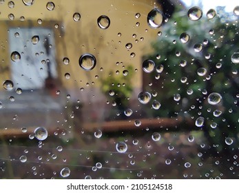 Raindrops On The Window Close Up After A Spring Rain Shower