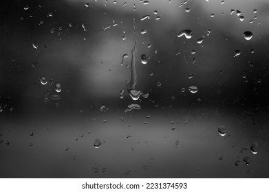 Raindrops on the window. Close-up of raindrops.