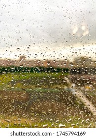 Raindrops on the window. Closeup, background, texture, copy space for text, empty space. Mobile photo.