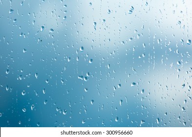 Raindrops On A Window During Bad, Rainy Weather.