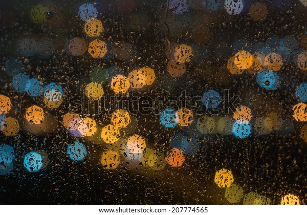 raindrops on window at\
night