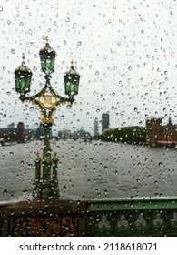 Raindrops on a window overlooking the River Thames 
