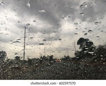 Raindrops on windshield.