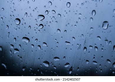 Raindrops On The Windshield Of A Car.