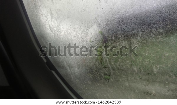 it rained in\
the car window in the\
afternoon
