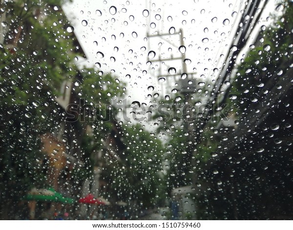 raining day​ in​ a\
car