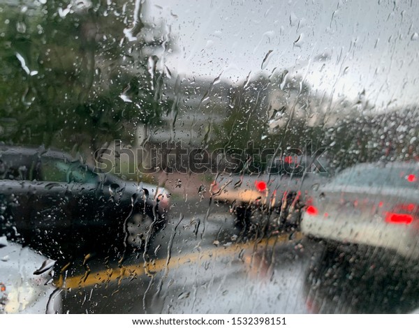 Raining outside of a\
car