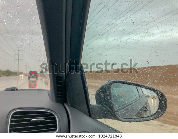 Raining\
and road construction, bad driving\
conditions.