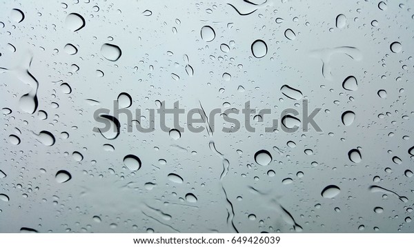 Raining water drop on car
glass