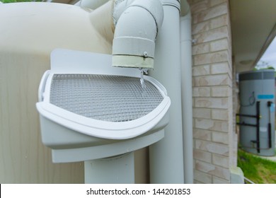 Rainwater Running Off Roof Into Rainwater Tank