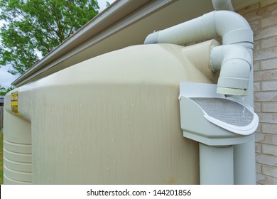 Rainwater Running Off Roof Into Rainwater Tank