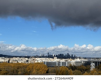Rainy cloud heading to La Défense in Paris, France