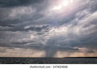 Rainy clouds over the sea