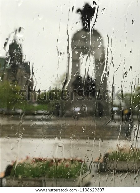 Rainy day behind a\
window