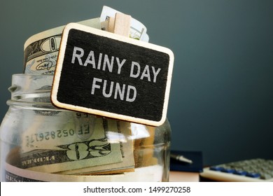 Rainy Day Fund Savings Jar With Cash.