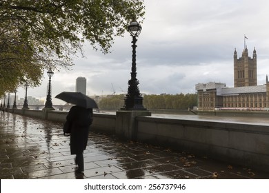 A rainy day on the South Bank of River Thames with Palace of Westminster in Background, London, England, UK - Powered by Shutterstock