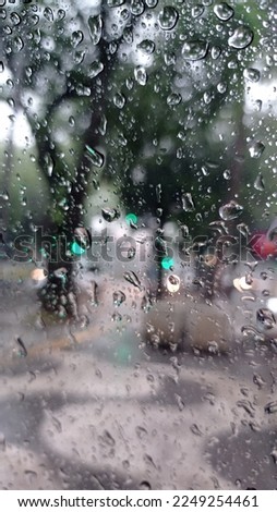 Rainy day with raindrops on the window 
