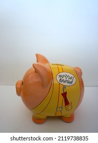 Rainy Day Savings Piggy Bank On White Background