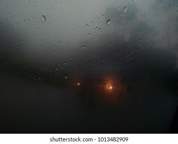 Rainy day through a rainy window