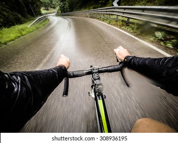 Rainy Day,man On Road Bike. POV, Original Point Of View. HDR Effects.