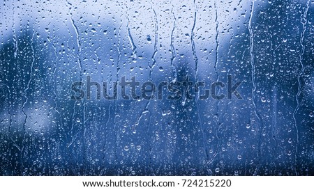 rainy days rain drops on the window surface 