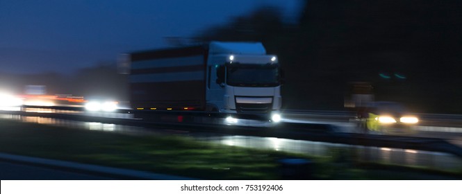 rainy highway traffic at night Motion Blur
