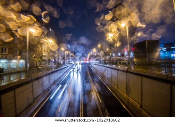 rainy night and traffic in\
the city 