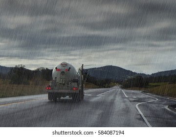 Rainy Road With Liquid Truck.