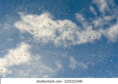 Rainy Sky Behind The Glass