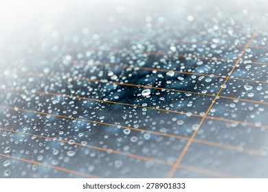 rainy weather and vehicles concept - close up of wet rear car glass