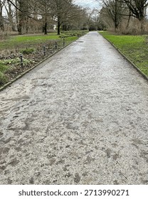 rainy wet path in a desolate park