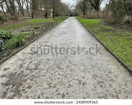 rainy wet path in a desolate park